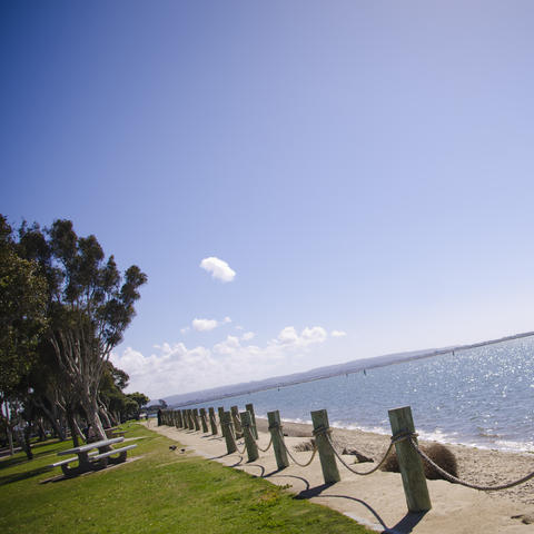 View of the blue sky and the blue water of San Diego Bay from Chula Vista Bayfront Park.