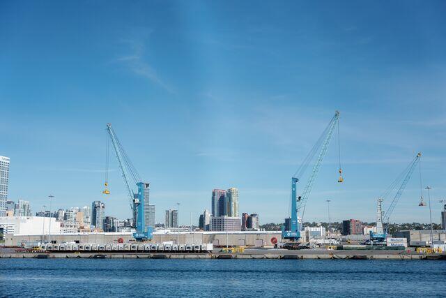 View from the bay of Tenth Avenue Marine Terminal with the two all-electric cranes.