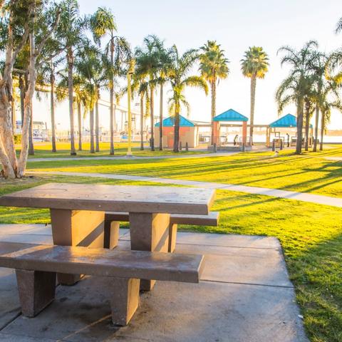 Table, grass, and trees at Cesar Chavez Park at the Port of San Diego