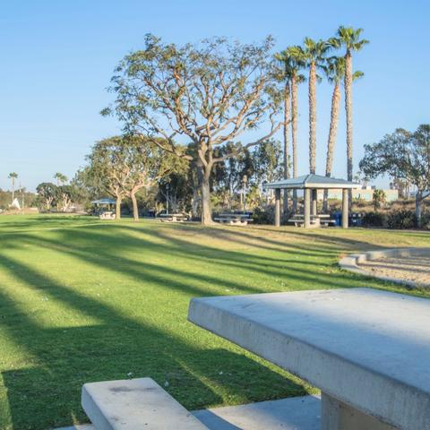 Picnic tables and grass at Chula Vista Marina View Park at the Port of San Diego