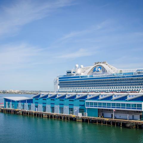 The Port Pavilion on the Broadway Pier at the Port of San Diego with a Princess Cruise ship docked.