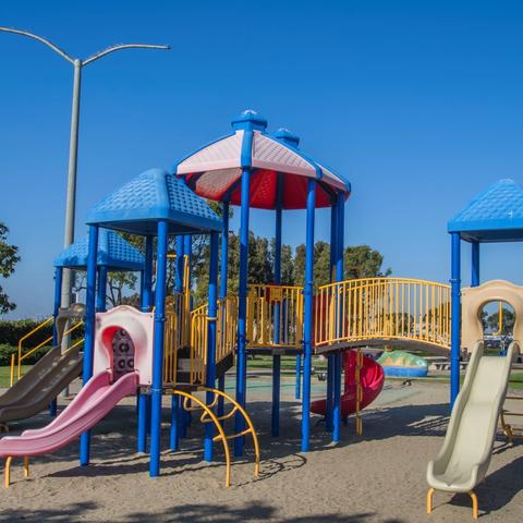 Playground over sand with slides and ladders at Pepper Park at the Port of San Diego