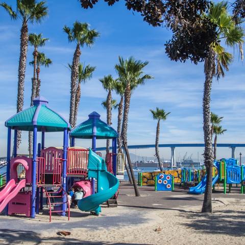Playground, trees, and sand at Coronado Tidelands Park at the Port of San Diego