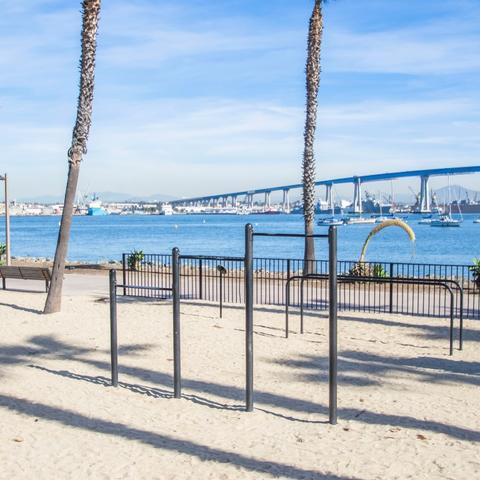 Exercise station on sand with view of San Diego-Coronado Bay Bridge in the background at Coronado Tidelands Park at the Port of San Diego