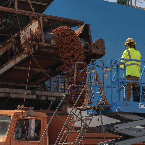 Bauxite unloading from a ship conveyer belt